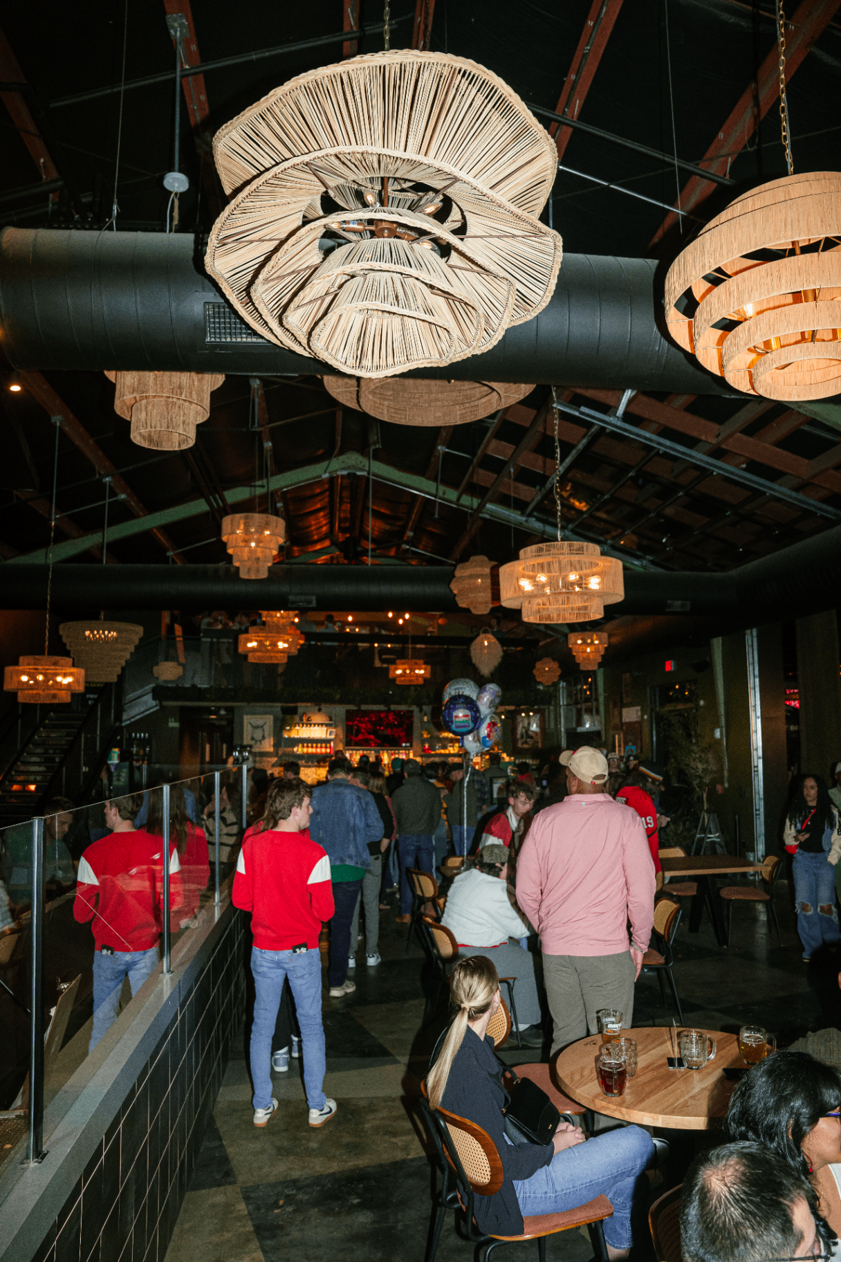 Inside The Grove at night with a full crowd